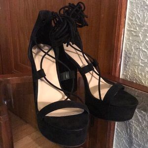 Black strap up heels